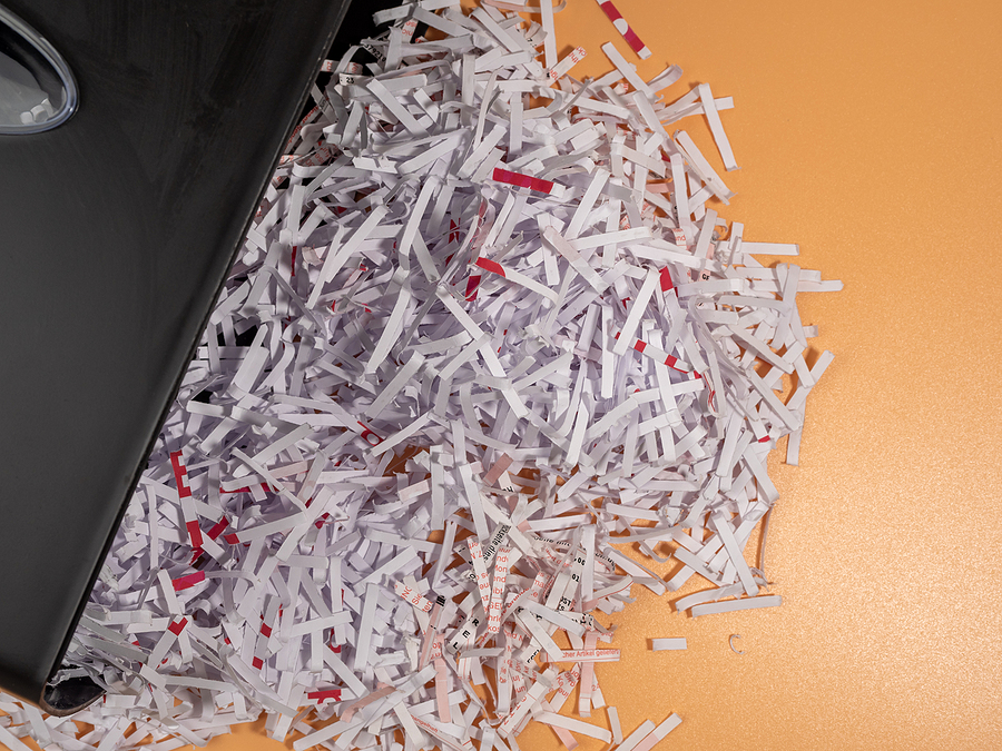 Cut paper. Stationery Document Shredder. Close up. document shredding services in Charlotte, NC